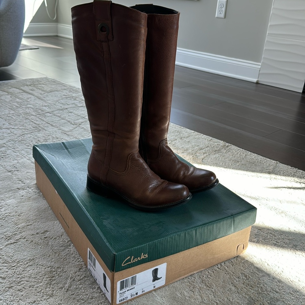 Clarks tall brown boots.  Size 5 1/2.  Gently used.